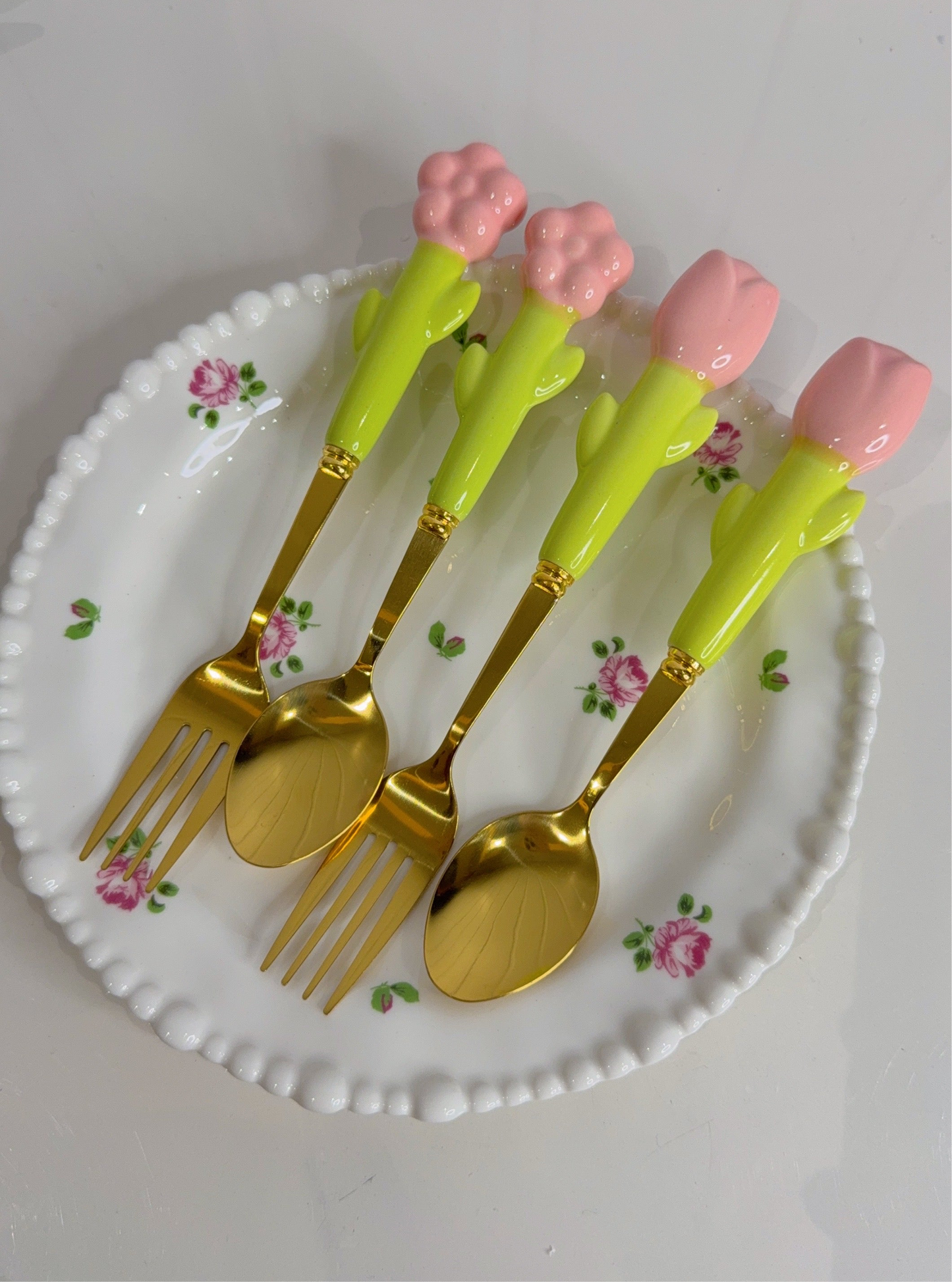 Set of Four Spoons and Forks