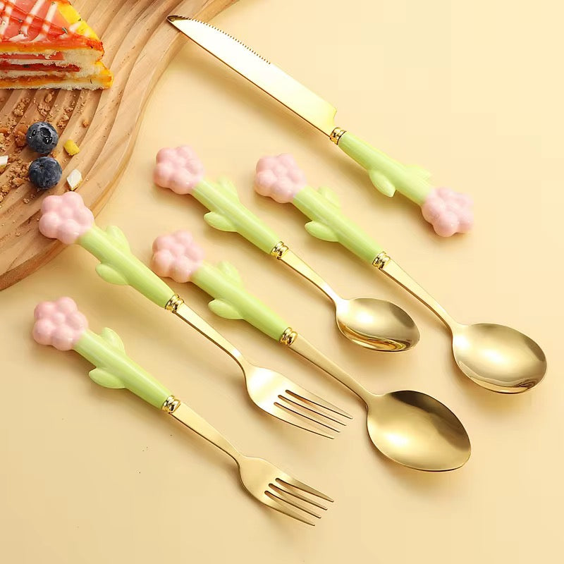 Set of Four Spoons and Forks