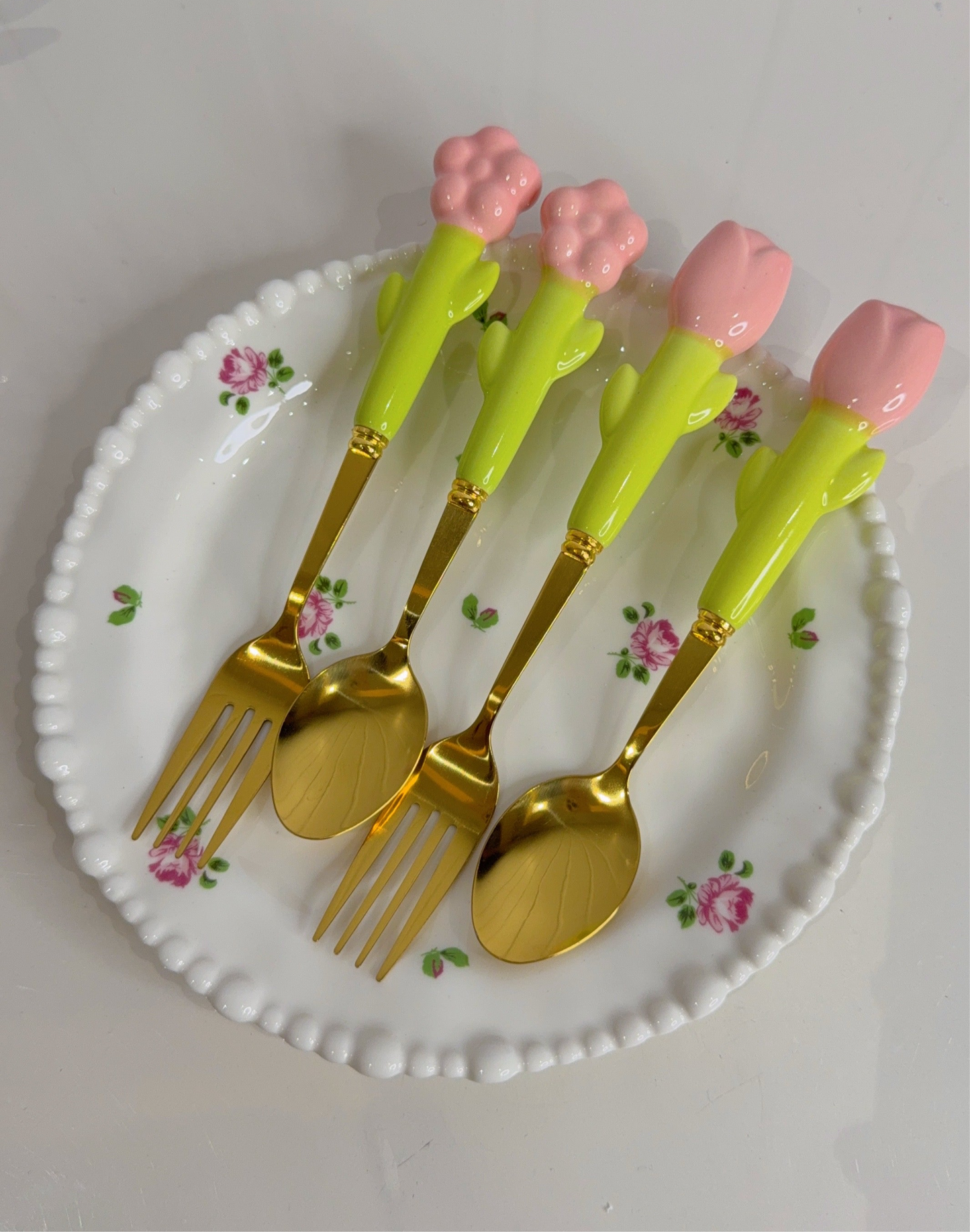 Set of Four Spoons and Forks