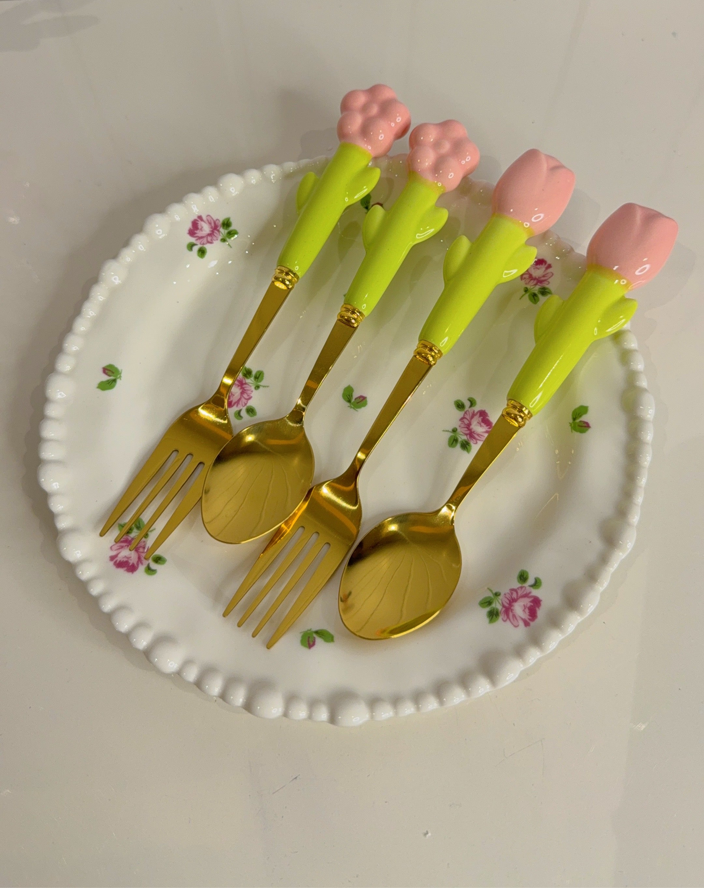 Set of Four Spoons and Forks