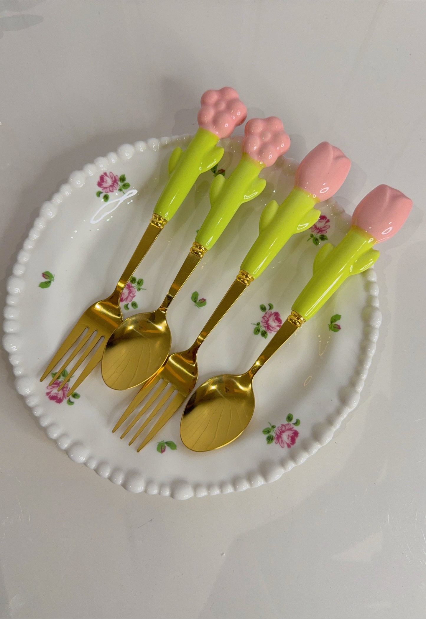 Set of Four Spoons and Forks