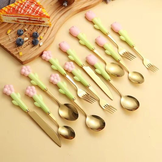Set of Four Spoons and Forks